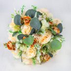 Hydrangea, roses and eucalyptus floral arrangement.